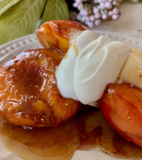 Caramelized Peaches With Caramel Sauce and Cream Cheese Topping