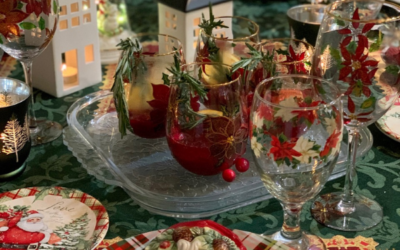 Santas, Poinsettias, Cranberry Bourbon Sours Table